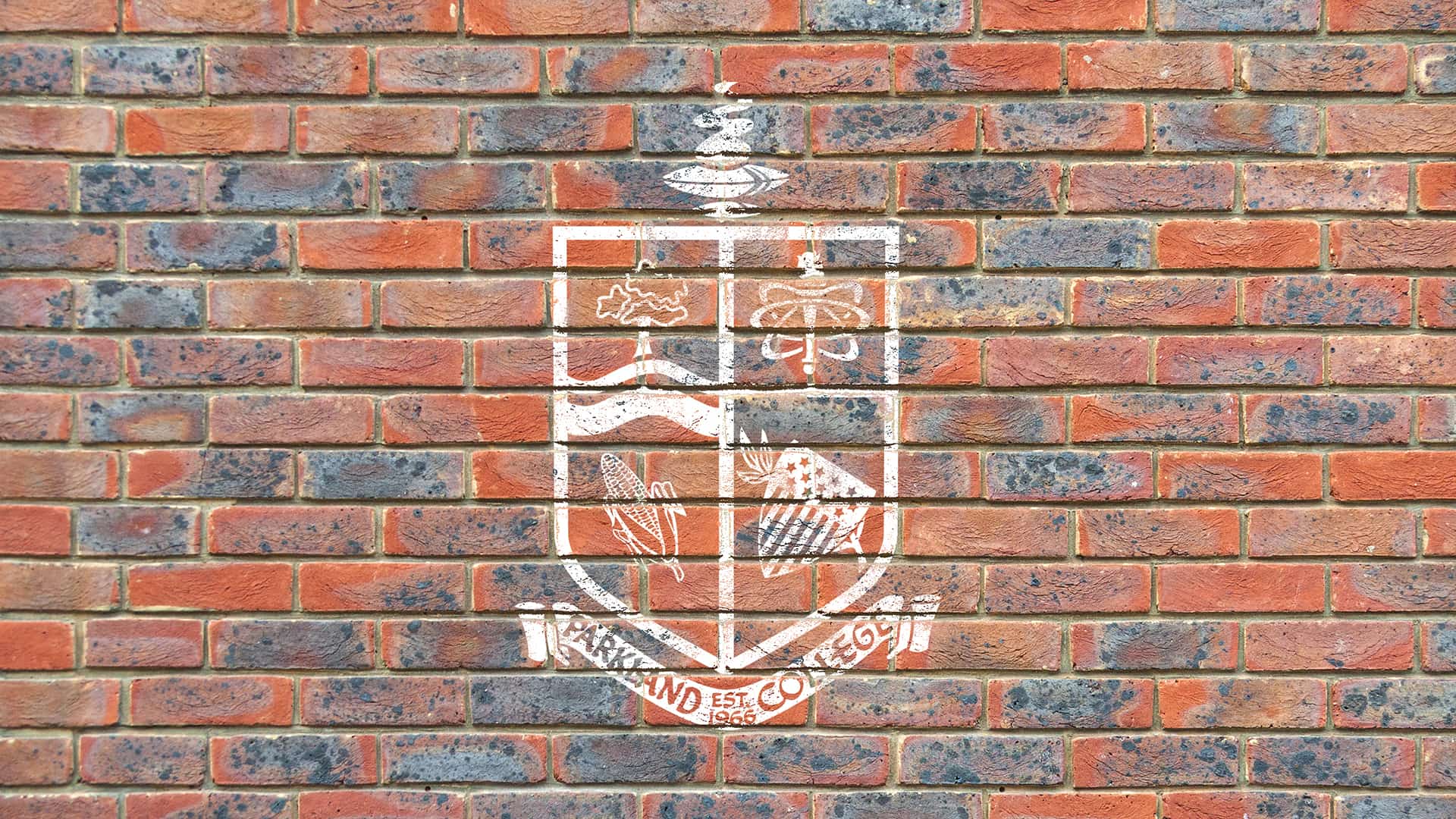brick wall with parkland crest
